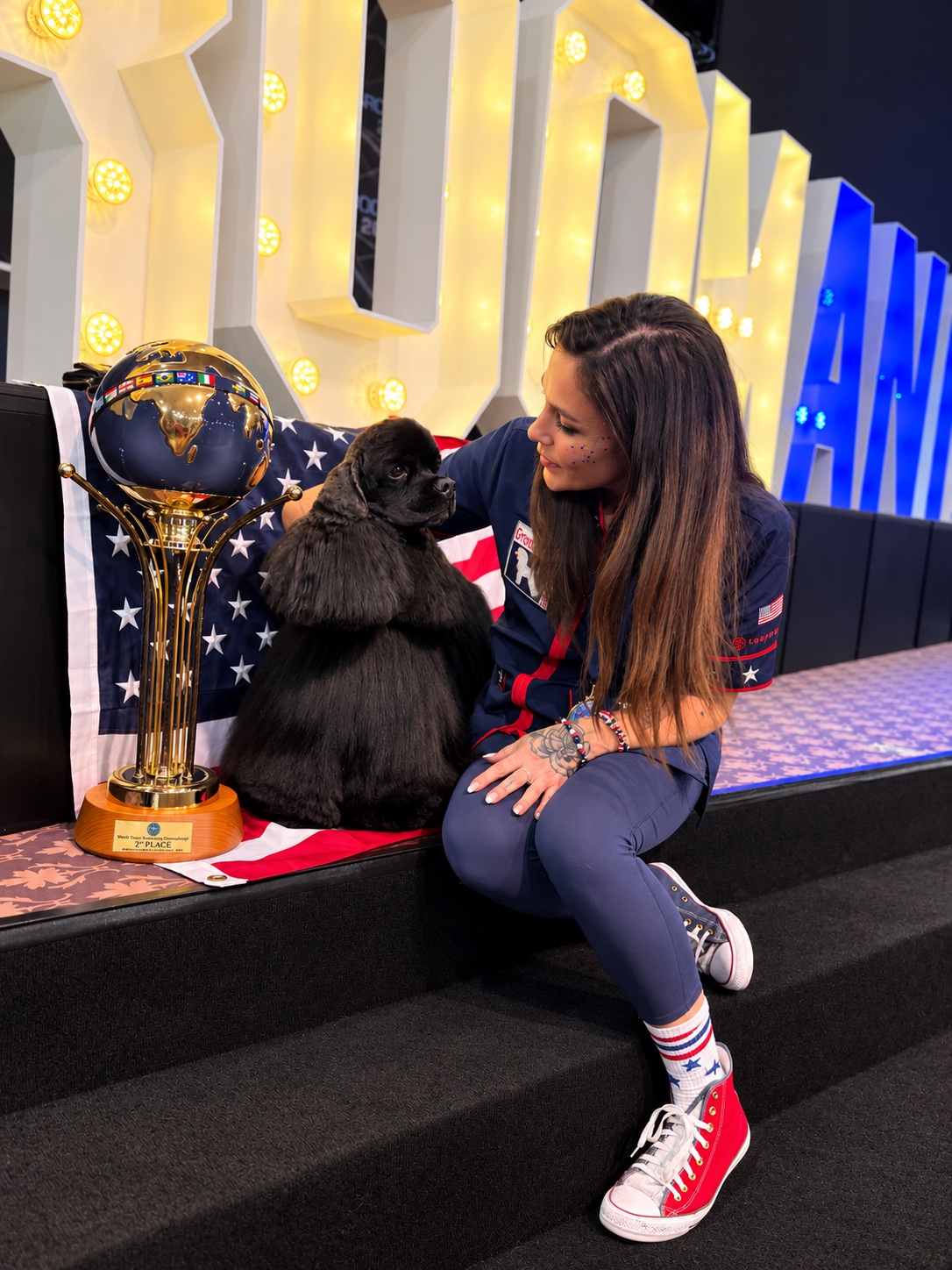 Mackensie with Chance and the world team trophy at Groomania 2026